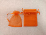 Оранжеви подаръчни торбички размер 7/9 см.